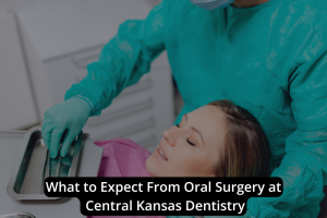 A dental professional in scrubs prepares a patient for oral surgery in a dental clinic. Text overlay reads, "What to Expect From Oral Surgery at Central Kansas Dentistry.